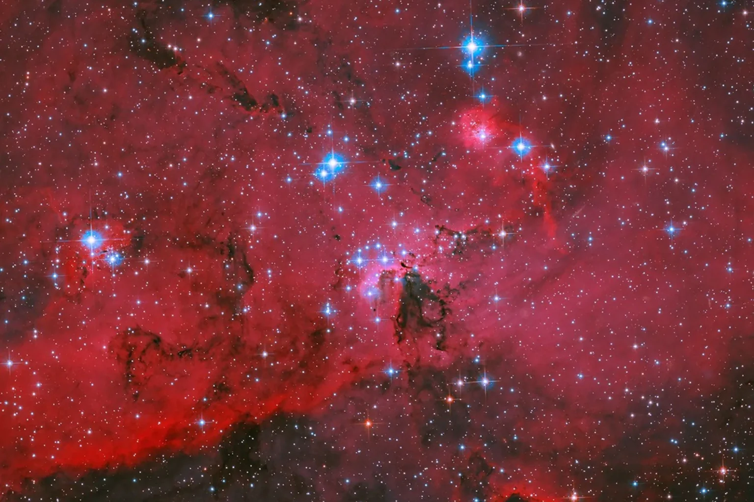 Εικόνα τεκμηρίωσης της NASA για το θέμα: Hubble Βλέπει Crimson Cloud και Stars.